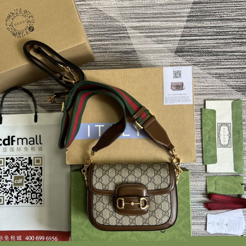 G*u*i satchel bags